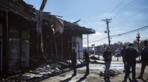 Hidden Treasures on South Florissant in Ferguson on Tuesday, Nov. 25, the night after the grand jury decision. Image: Samuel Corum/Anadolu Agency/Getty Images
