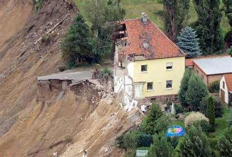 House built on sandy soil. Erosion.
