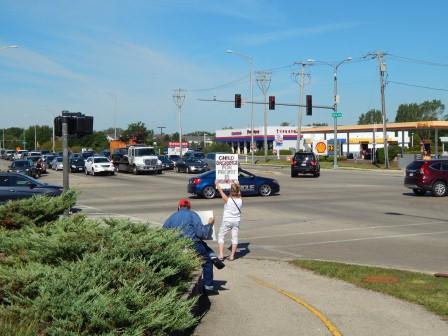 “Child Sacrifice for Profit is Demonic” Corner of Eola Rd. and E. New York St., Aurora, IL